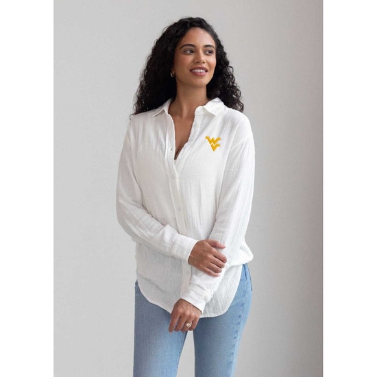Model wearing the white chickad WVU women's long sleeve button up with a Flying WV Logo embroidery at left chest