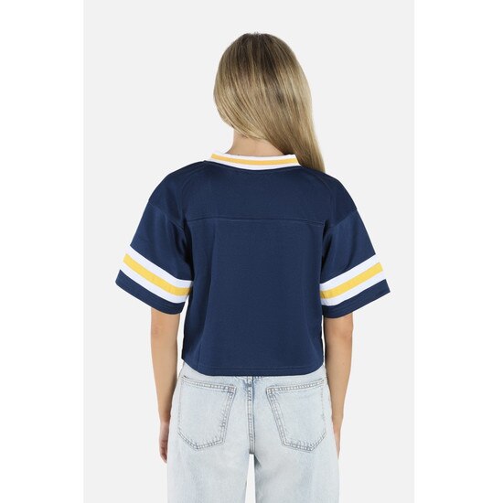 Back of the model wearing the navy WVU cropped football jersey