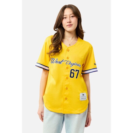 Another model wearing the gold WVU women's button-up baseball jersey with West Virginia over 67