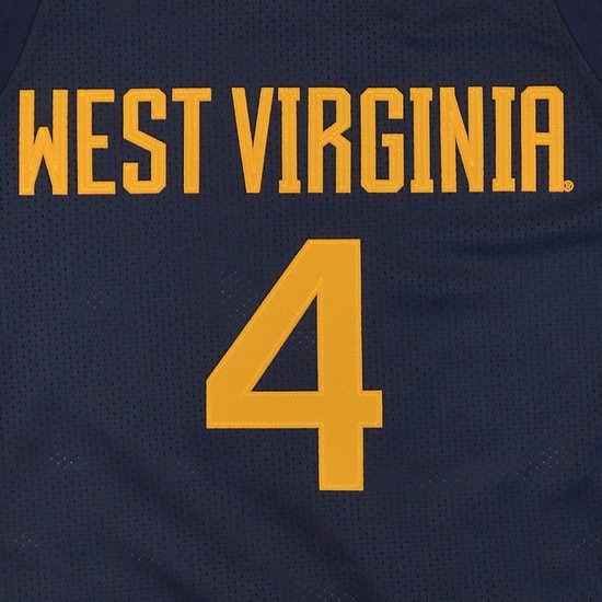 Close up of the West Virginia over a number 4 on the front of the navy WVU #4 Deuce McBride basketball jersey